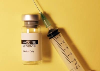 Vaccine And Syringe