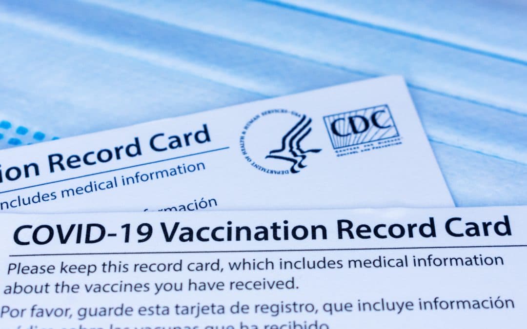 closeup.,covid 19,vaccination,record,cards,issued,by,cdc,,united,states