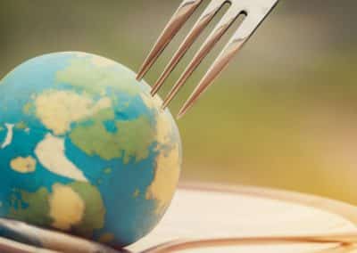 fork,slammed,on,globe,model,placed,on,plate,for,serve