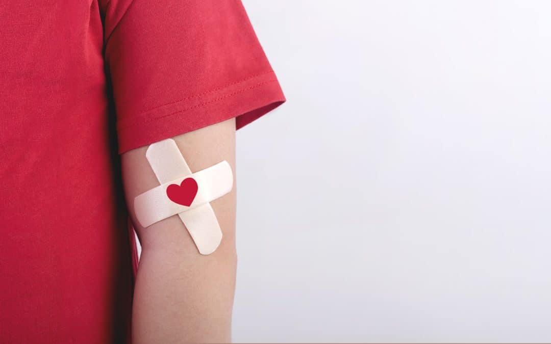 child,with,a,heart,drawn,on,his,arm.,blood,donation