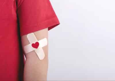 child,with,a,heart,drawn,on,his,arm.,blood,donation