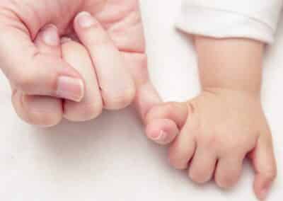 mom,and,baby,hands,promise,friendship,of,generations,,new,family