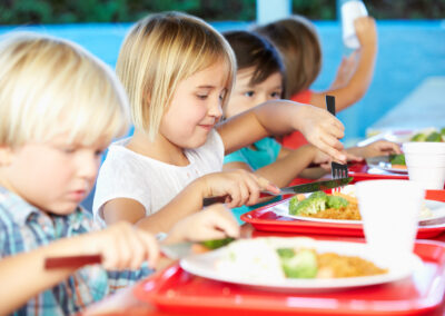 elementary,pupils,enjoying,healthy,lunch,in,cafeteria
