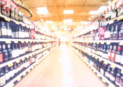 blurred,image,of,wine,shelves,with,price,tags,on,display