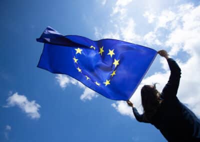 young,woman,holding,european,union,flag.,voting,,election,concept.